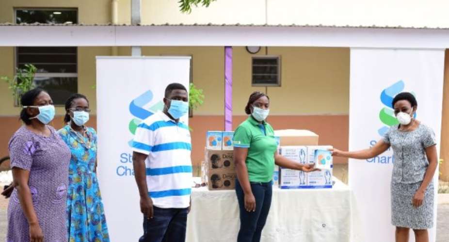 COVID-19: StanChart Donates PPE, Testing Equipment To Korle-Bu, KCCR