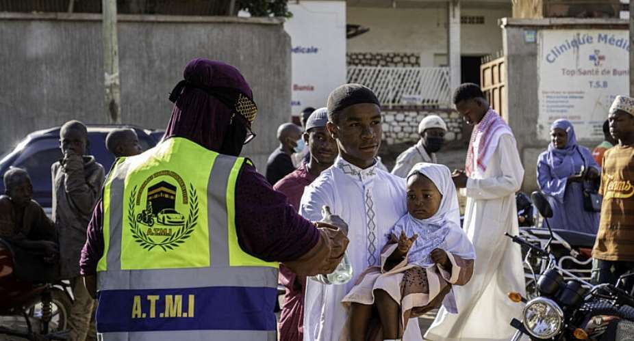 A worshipper has his temperature taken outside a mosque in Bunia, in the eastern Democratic Republic of Congo, on May 27, 2026 the first day of Eid al-Adha, the Feast of Sacrifice. -  Glody Murhabazi, AFP