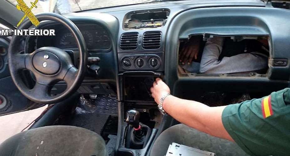 When the Spanish police opened the glove compartment, they found an illegal immigrant inside