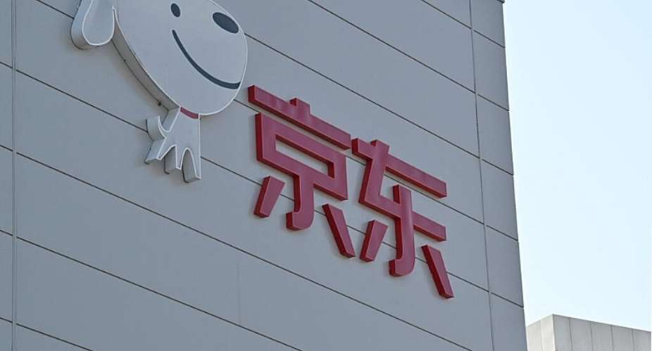 A logo of JD.com or Jingdong, a Chinese online retailer, at its warehouse in Beijing on 11 November 2025. The company wants to take a large share in France’s Fnac Darty electronics company. -  AFP - ADEK BERRY