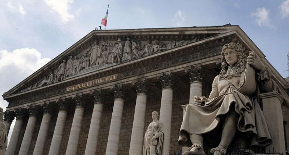 FILE - The statue of French statesman Jean-Baptiste Colbert in front of the French National Assembly in Paris on June 10, 2020. Colbert drafted the Code Noir which was promulgated two years after his death to regulate the conditions of slavery in French overseas colonies. -  Francois Mori, AP