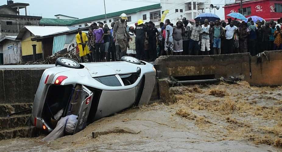 The vehicle washed away by the Flood at the Bridge near Amegashie House