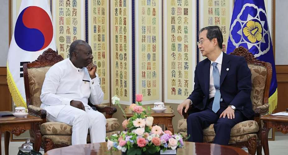 Mr. Ken Ofori-Attaleft, Ghana's Minister of Finance and H.E Han Duck-so, Prime Minister of South Korea