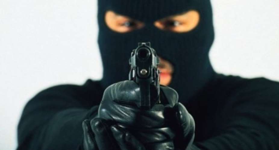 Spintex: Police engage in gun battle with two robbers at Pan African Savings and Loans