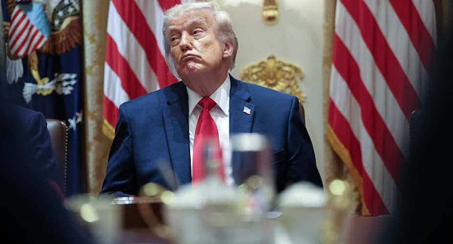 US President Donald Trump listens to members of his Cabinet speak during a meeting in the Cabinet Room of the White House on May 27, 2026 in Washington, DC. -  Win McNamee, Getty Images via AFP