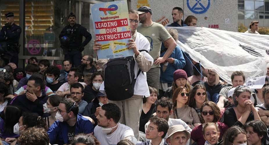 Climate activists protest against TotalEnergies climate strategy in May 2024. - AP - Thibault Camus