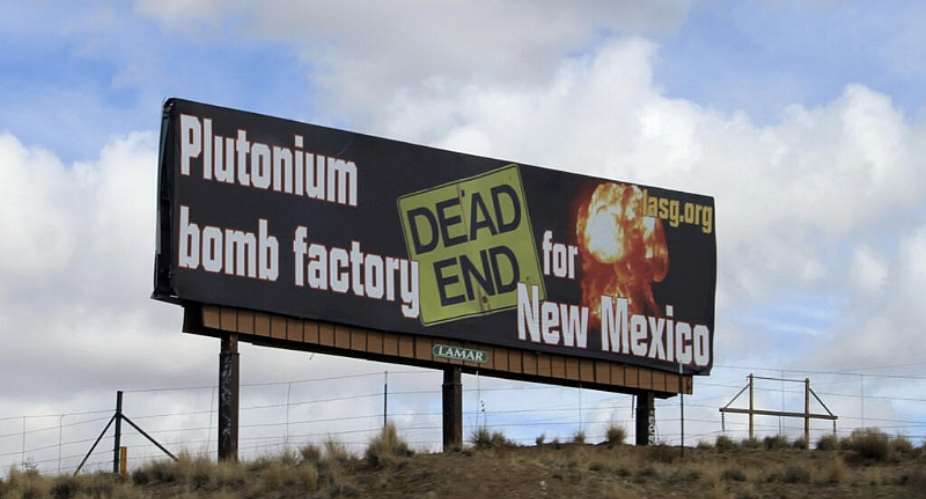 File photo of a billboard of the Los Alamos Study Group taking aim at the US governments plans to ramp up production of plutonium cores taken near Bernalillo, New Mexico on February 17, 2021. -  Susan Montoya Bryan, AP