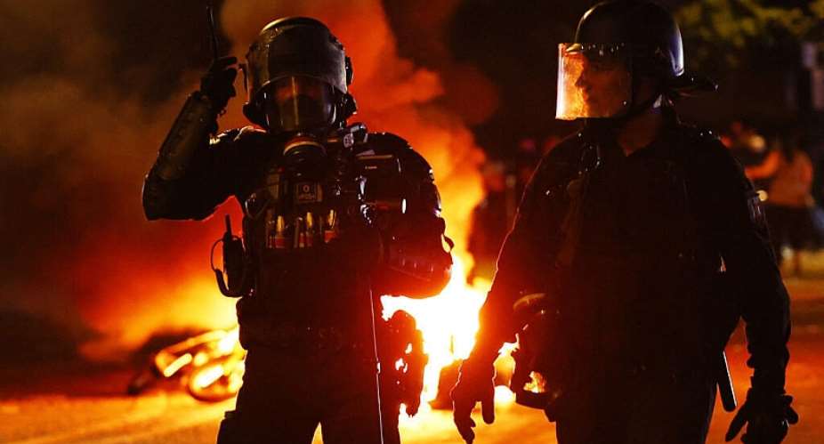 Police officers in the streets after Paris St Germain won the UEFA Champions League in Paris, France on May 31, 2026. -  Abdul Saboor, Reuters
