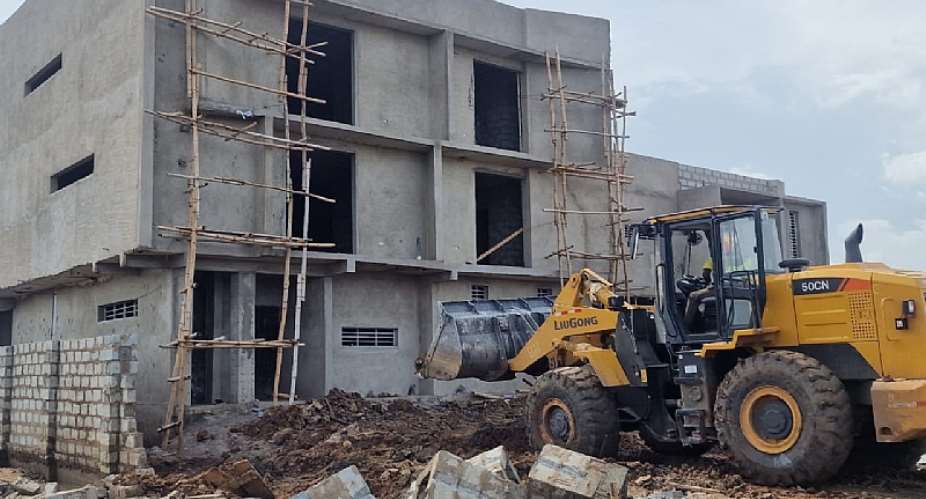 A building being demolished over encroachment at Ramsar site
