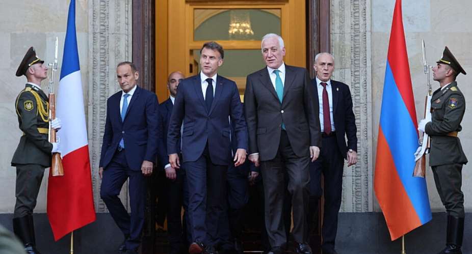 Emmanuel Macron leaves after a meeting with Armenias President Vahagn Khachaturyan at the presidential palace in Yerevan on 4 May. - AFP - LUDOVIC MARIN