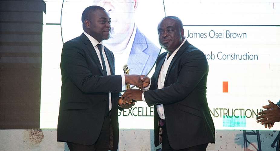 Joshob CEO James Osei Brown receiving award from Instinct Wave CEO, Akin Naphtal.