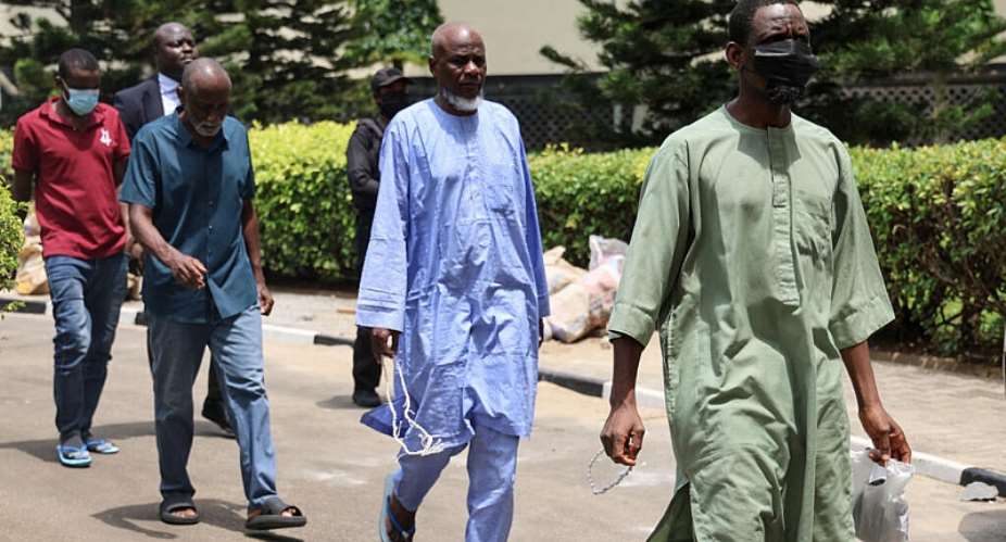 Suspects in an alleged 2025 coup plot arrive at the Federal High Court in Abuja, on 22 April, 2026. - AFP - LIGHT ORIYE TAMUNOTONYE