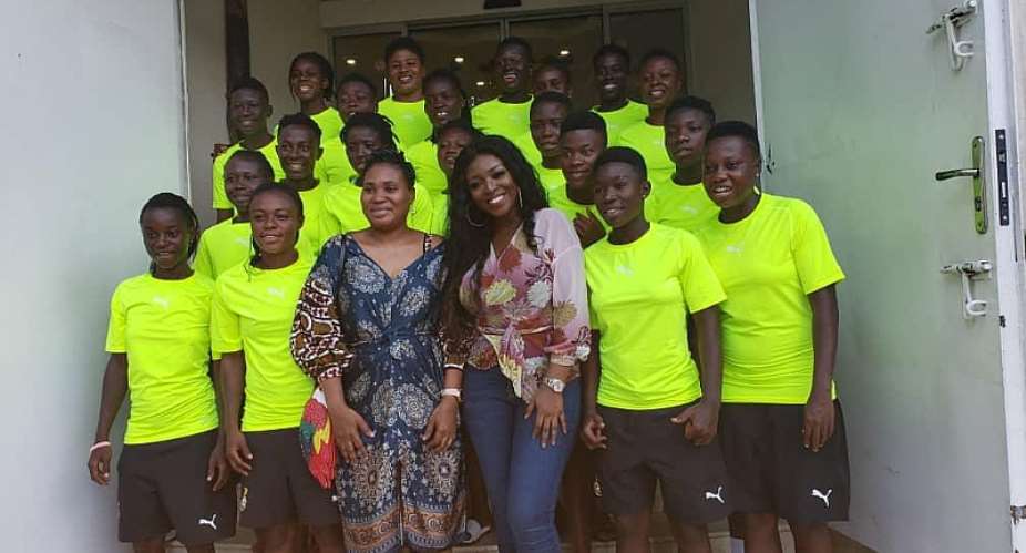 Yvonne Okoro in a pose with the Black Queens team