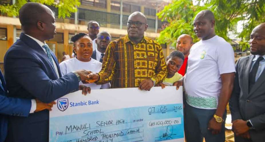 Stanbic Bank Ghana Presenting a Cheque to Mawuli School in Ho