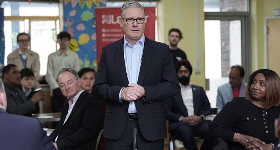 Britains Prime Minister Sir Keir Starmer speaks to Labour Party members at Kingsdown Methodist Church Hall, in Ealing, west London, Friday May 8, 2026, a day after the local elections. - AP - Stefan Rousseau