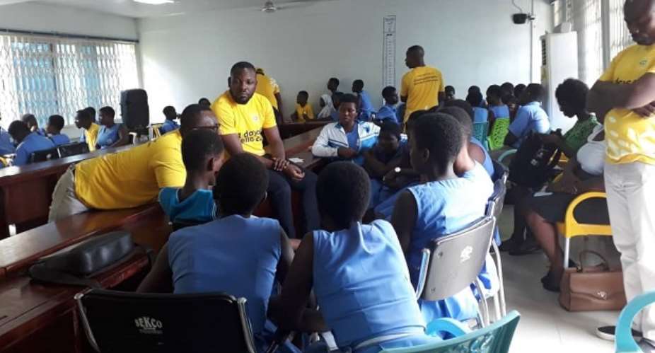 Some MTN officials interacting with students of Sekondi College