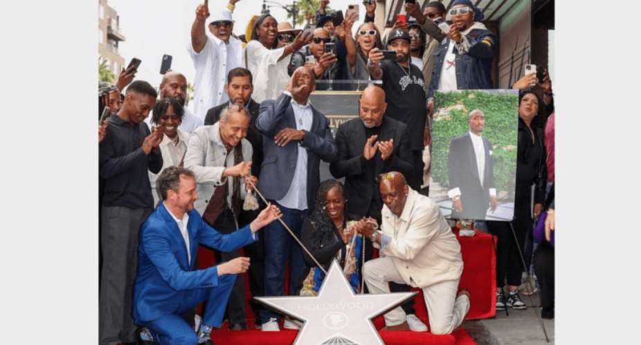The late rapper Tupac Shakur's family and friends dedicate his star on the Hollywood Walk of Fame.  Image source: 2PACTwitter