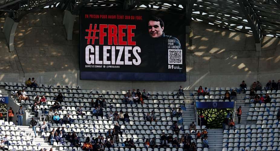 A message of support for jailed journalist Christophe Gleizes at a Ligue 1 football match in Paris, on May 3, 2026. -  Franck Fife, AFP