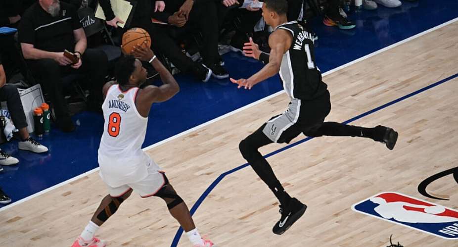 Victor Wembanyama of the Spurs attempts to bother OG Anunoby of the Knicks during Game 3 of the NBA Finals, June 8, 2026, in New York -  SAUL LOEB, AFP