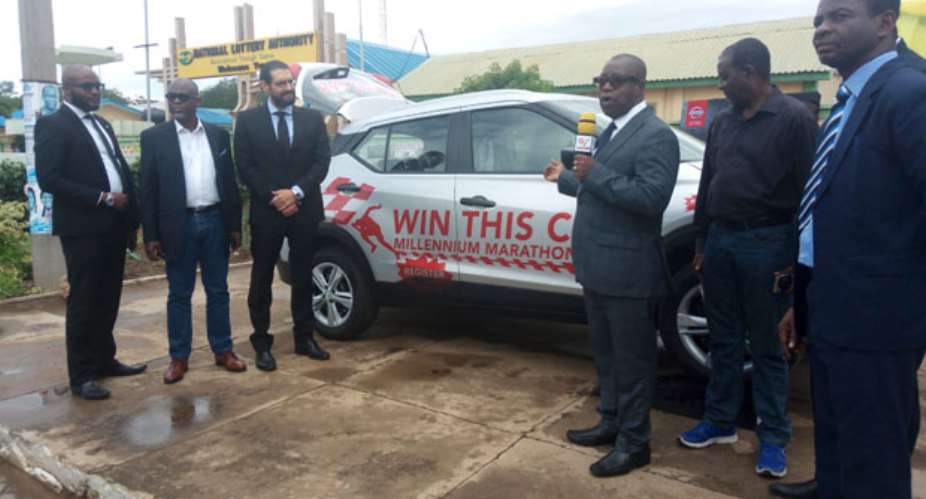 Officials at the event unveiling the vehicle at stake