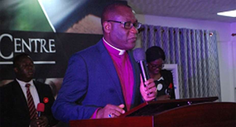 Rev. Dr. Ernest Adu-Gyamfi speaking at the event