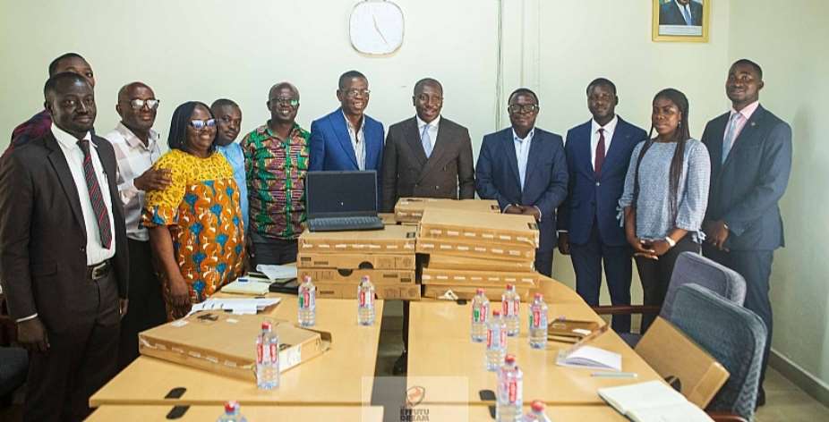 Afenyo-Markin supports Graphic Communications Group, New Times Corporation with 40 laptops