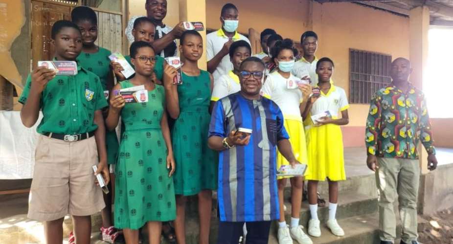 Hon. Kpotosu in pose with some candidates
