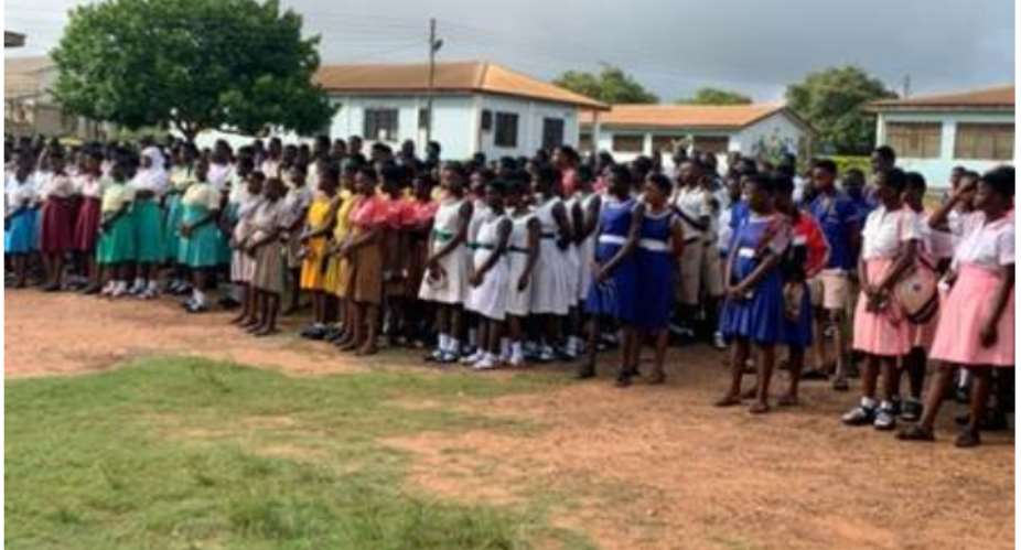Candidates at parade preparing for the exams whilst MP, MCE and his entourage in one of the centres inspecting the candidates