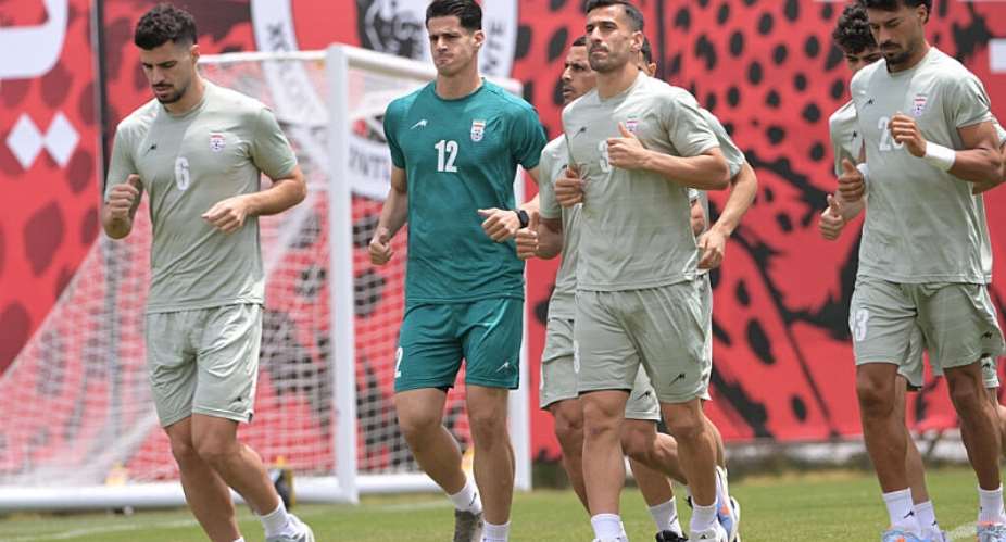 Iranian football players Saeid Ezatolahi (6), Payam (12) Niazmand, Hossein Kanani (13) and Ramin Rezaeian (23) training for the World Cup in Mexico on June 11, 2026. -  Guillermo Arias, AFP