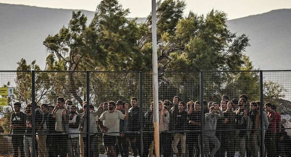 Migrants irregularly entering the EU will have their fingerprints taken under new rules coming into force on June 12 -  Aris MESSINIS / AFP