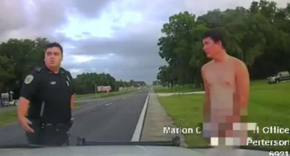 Watch: Naked man going for a stroll gets arrested