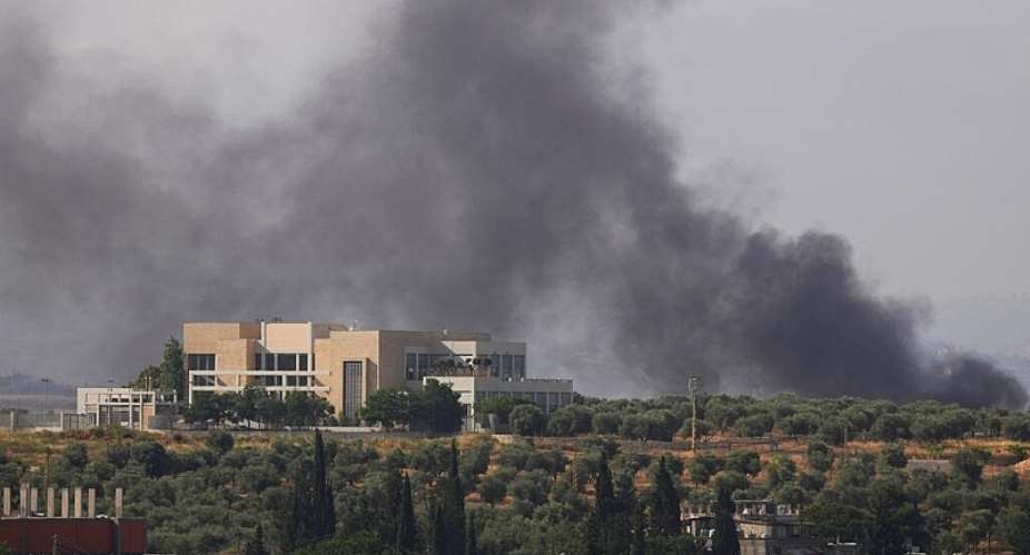 Smoke billows from southern Lebanon following an Israeli strike, as seen from Nabatieh, Lebanon, June 13, 2026. - REUTERS - Stringer