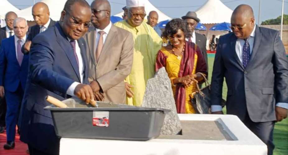 The Prime Minister of the Togolese Republic, Mr. Komi Selom Klassou, laying down the first stone of the next Kkli power station. Eranove