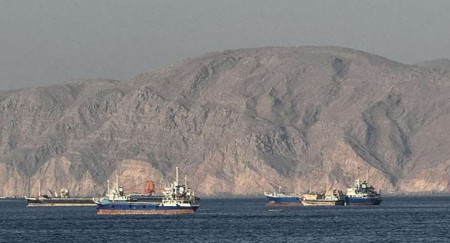 Vessels anchored in the Strait of Hormuz off the port city of Khasab on Omans northern Musandam Peninsula on May 17, 2026. -  AFP