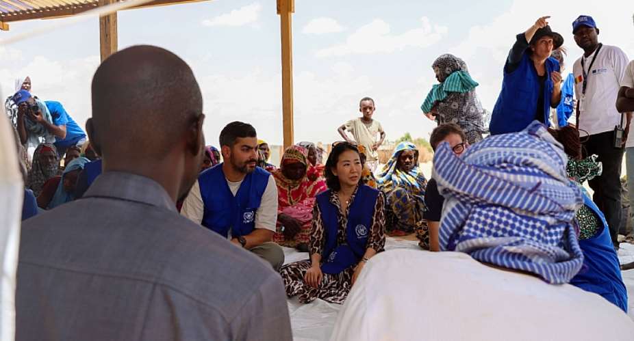 In eastern Chad, at the Adr border crossing, IOM Deputy Director SungAh Lee met with some of the families that fled the conflict in Sudan. Photo: IOM Chad/2026.