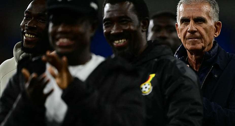 Carlos Queiroz (right) says his players have been keen to embrace various philosophies of playing football in their desire to create a team style. - AFP - BEN STANSALL