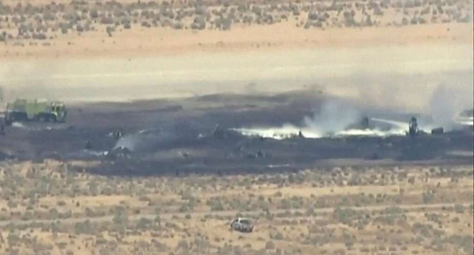 Smoke rises from a blackened part of Edwards Air Force Base after the crash of a U.S. Air Force B-52 bomber aircraft in Edwards, California on June 15, 2026. -  KABC via Reuters