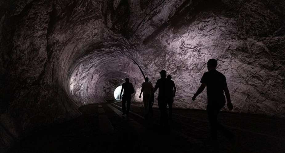 Visitors inside the “Cavern” installation on the Pont-Neuf in Paris, the latest work by French artist JR, on June 15, 2026. -  Joel Saget, AFP