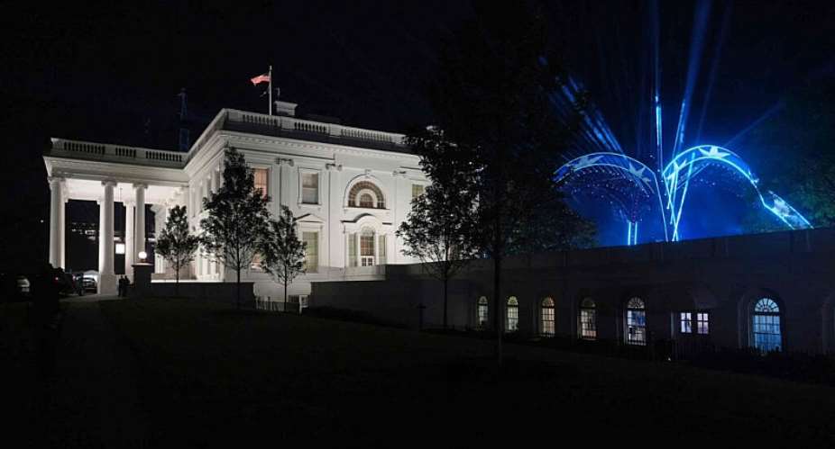 The White House is seen as UFC Freedom 250 is held on the South Lawn of the White House, June 14, 2026. -  Julia Demaree Nikhinson, AP