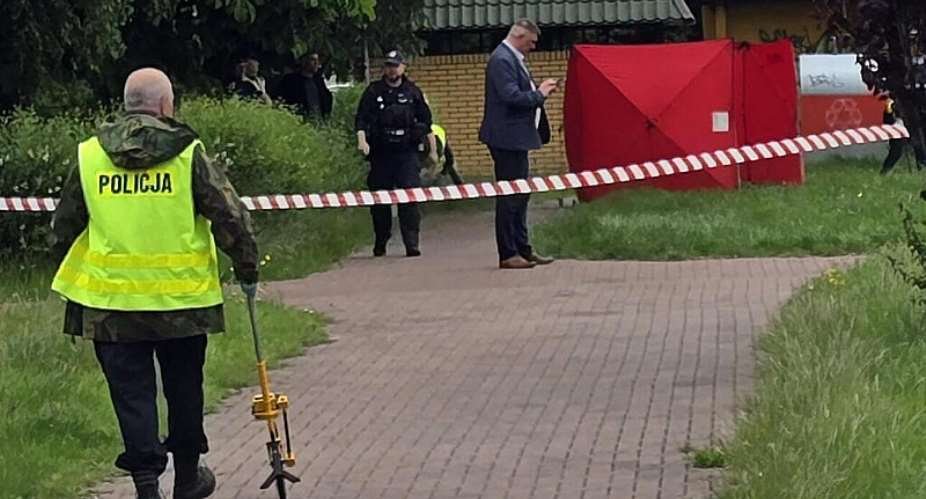 Police work at a crime scene covered with a tent in Biala Podlaska, eastern Poland on June 16, 2026, where Russian artist Semyon Skrepetsky, known for his satirising Russian President Putin, was shot dead. -  Piotr Pyrkosz, AFP