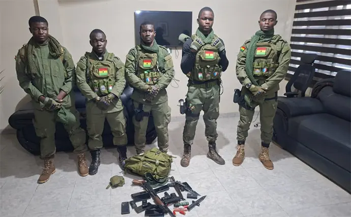 Suspects in their fake military uniforms