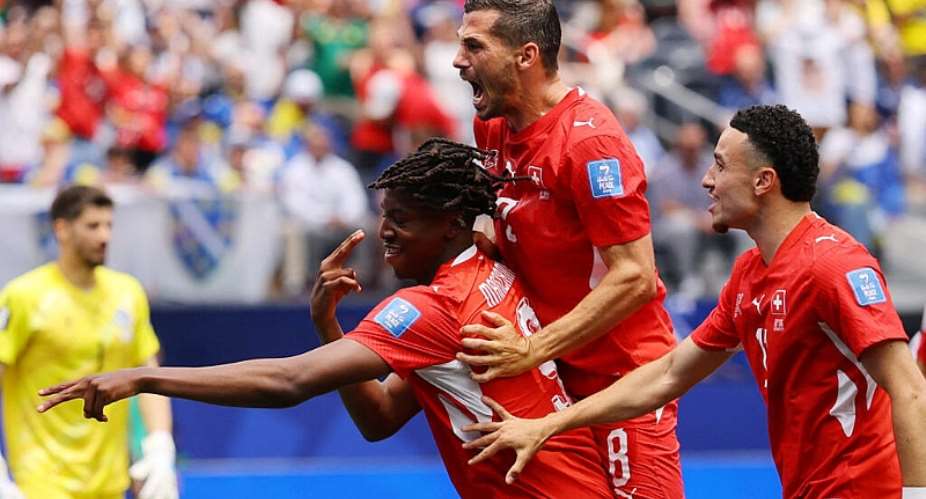 Switzerlands Johan Manzambi celebrates scoring their first goal with Remo Freuler and Ruben Vargas. -  Daniel Cole, Reuters