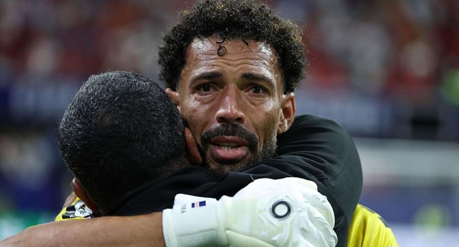 Getty ImagesImage caption: Vozinha made seven saves against Spain