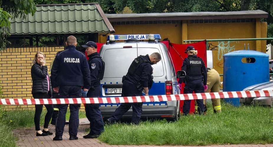 Police work at a crime scene covered with a tent in Biala Podlaska, eastern Poland on June 16, 2026, where a Russian artist was shot dead. -  Piotr Pyrkosz, AFP