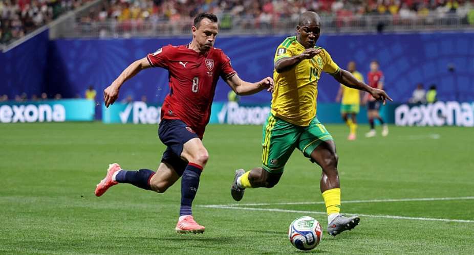 Vladimir Darida of Czechia controls the ball under pressure from Mbekezeli Mbokazi of South Africa during the FIFA World Cup 2026 Group A match between Czechia and South Africa at Atlanta Stadium on June 18, 2026 in Atlanta, Georgia. -  Lars Baron, AFP