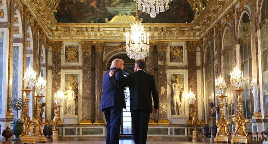 US President Donald Trump receives a tour of the Chateau de Versailles from French President Emmanuel Macron ahead of a dinner on 17 June 2026. The dinner at Versailles followed the conclusion of this weeks Group of 7 (G7) summit in Evian, France. - Getty Images via AFP - ANNA MONEYMAKER