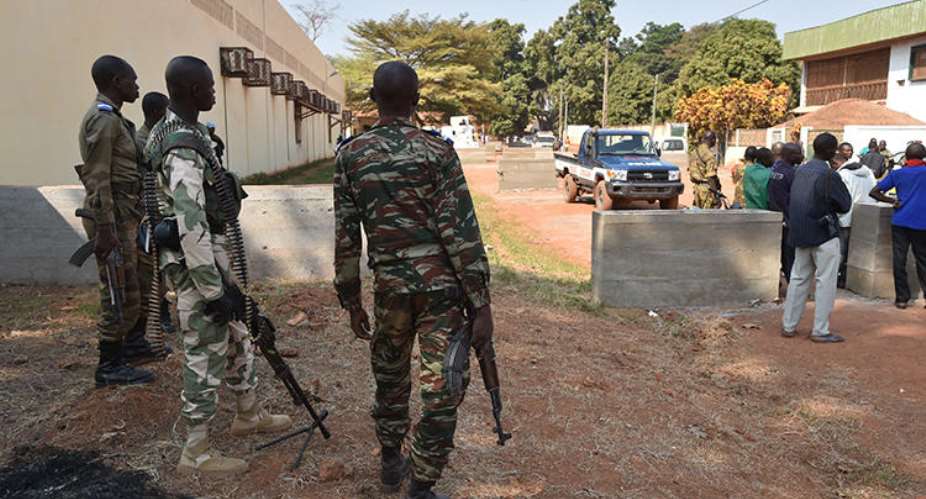 Central African Republic gendarmes and police officers are seen on January 2, 2016, in Bangui. Police in Bangui allegedly assaulted two French reporters from AFP recently. AFPIssouf Sanogo