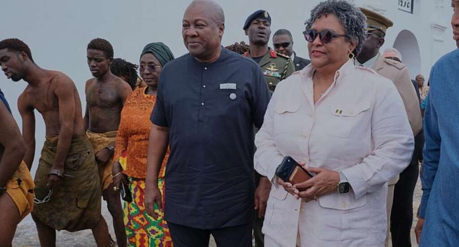 Ghanas President John Dramani Mahama (L), Barbados Prime Minister Mia Amor Mottley (C) and Ghanaian Foreign Minister Samuel Okudzeto Ablakwa (R) arrive at Osu Castle in Accra for a ceremony commemorating the abolition of slavery, 19 June 2026. -  AP Photo/Reuben Ekow Quansah