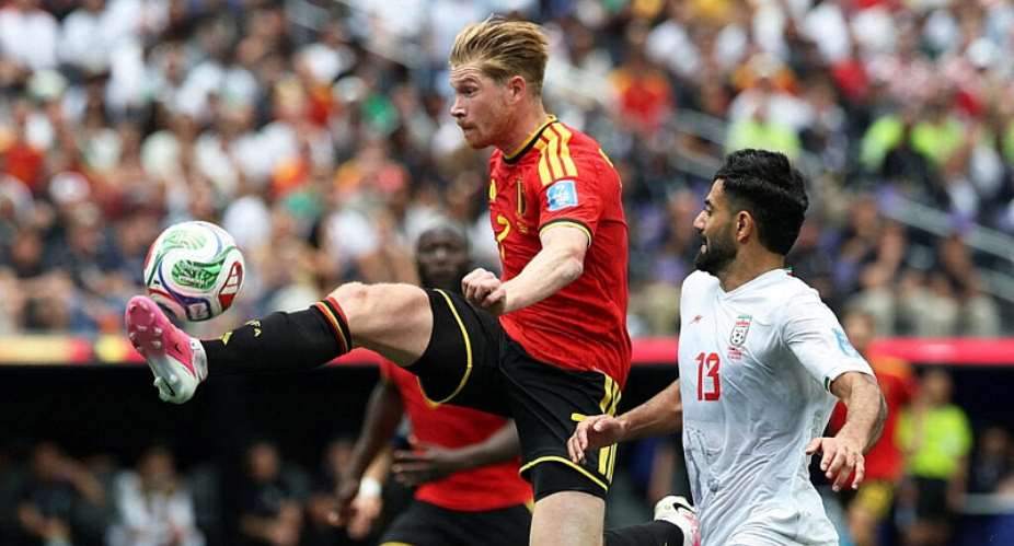 Belgiums Kevin De Bruyne in action at the Los Angeles Stadium with Irans Hossein Kanani. -  Kiyoshi Mio, Imagn Images via Reuters
