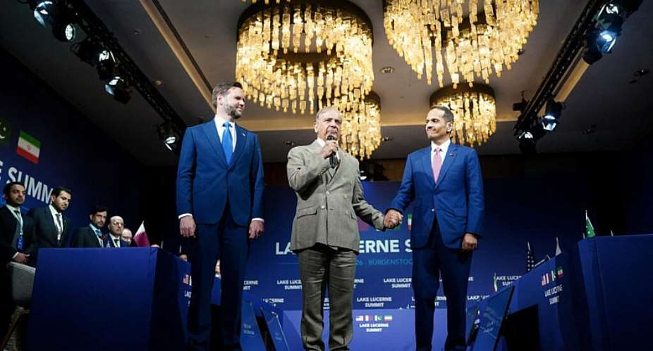 Pakistans Prime Minister Shehbaz Sharif (C) and Qatars Prime Minister Sheikh Mohammed bin Abdulrahman bin Jassim al-Thani hold hands next to US Vice-President JD Vance prior to a quadrilateral meeting between the United States, Iran, Pakistan and Qatar in Switzerland, on June 21, 2026. -  AFP, Nathan Howard